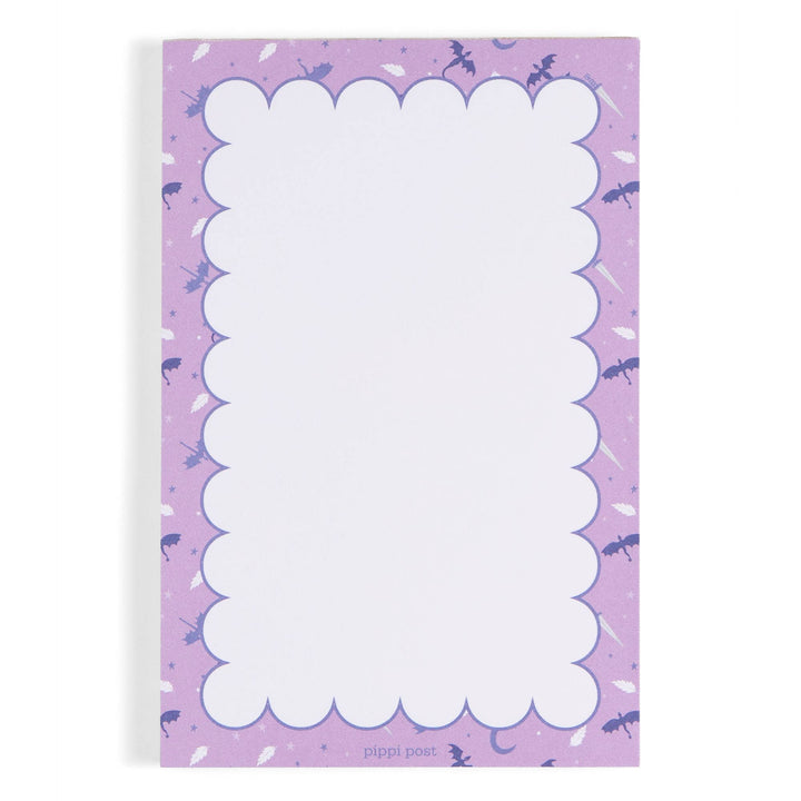 Notepad with purple border and white scalloped edge on a white background