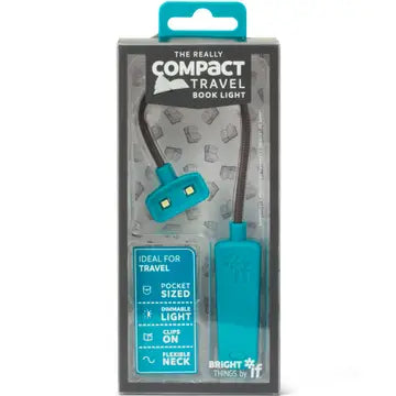 Compact travel book light in packaging on a white background