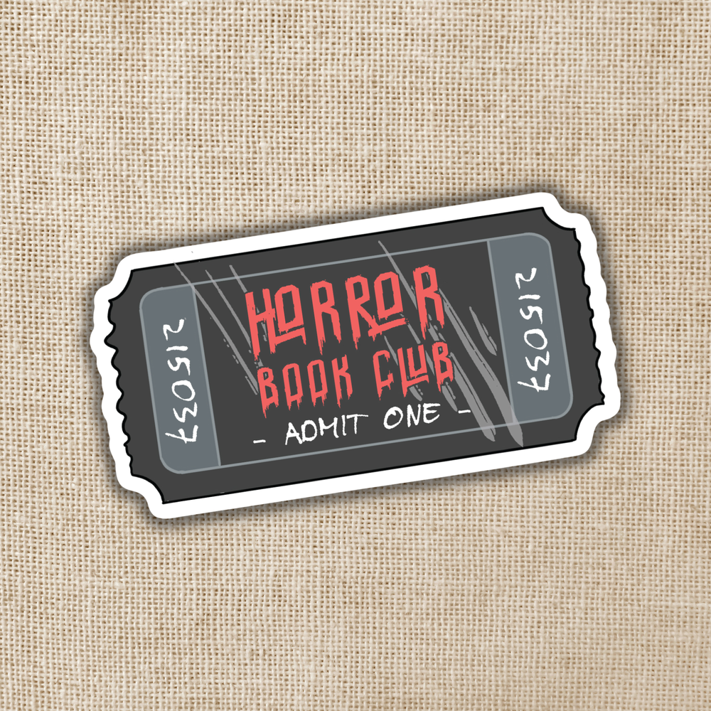 Sticker resembling a movie ticket with 'Horror Book Club' text on a textured beige background
