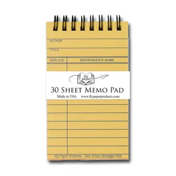 Yellow memo pad with text and branding on a white background