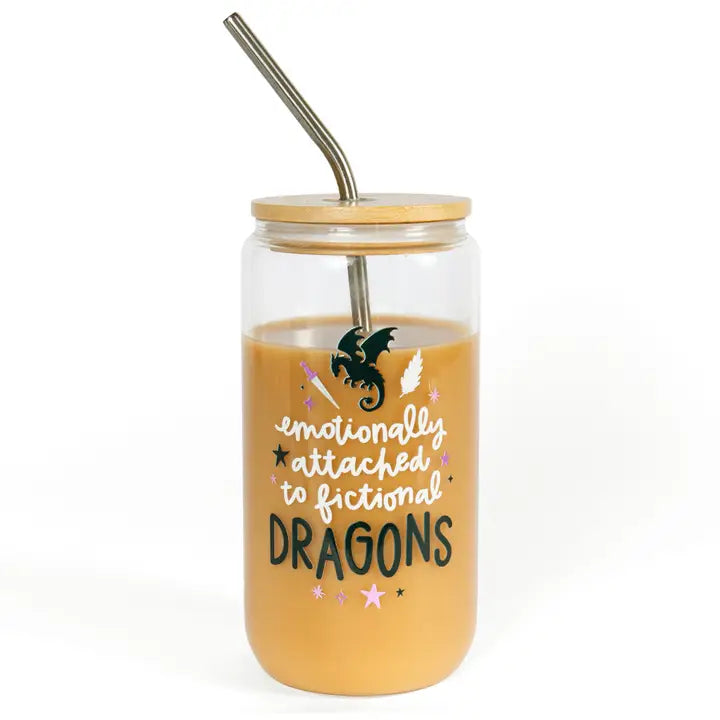 Jar with straw lid containing a drink with text and dragon illustration on a white background
