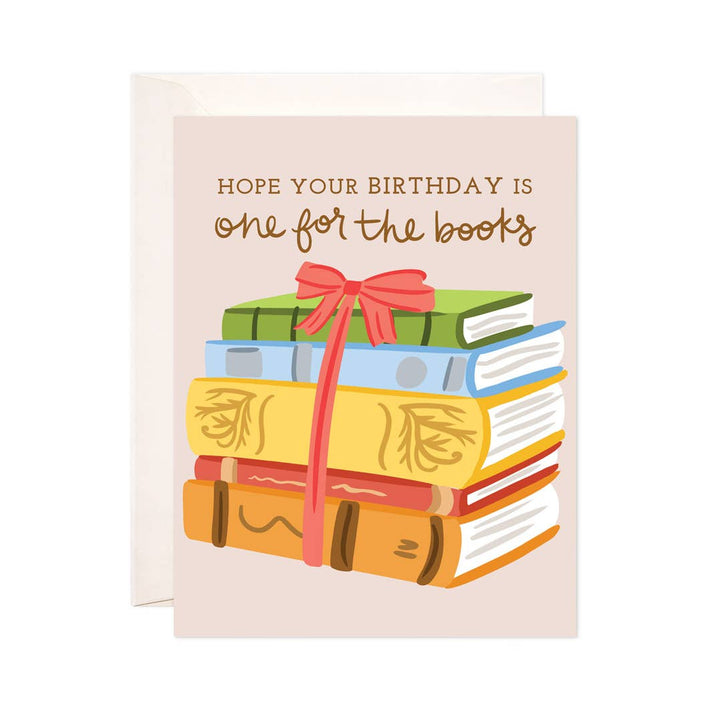 Greeting card with books and a bow, featuring the text &