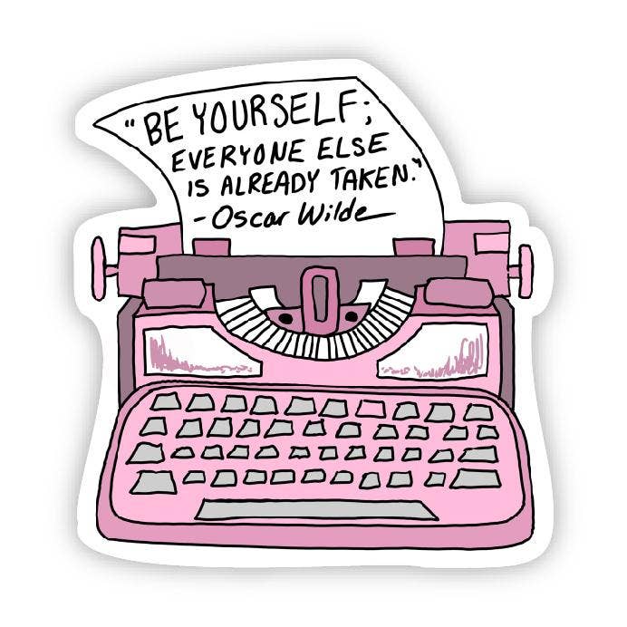Pink typewriter sticker with Oscar Wilde quote on a white background