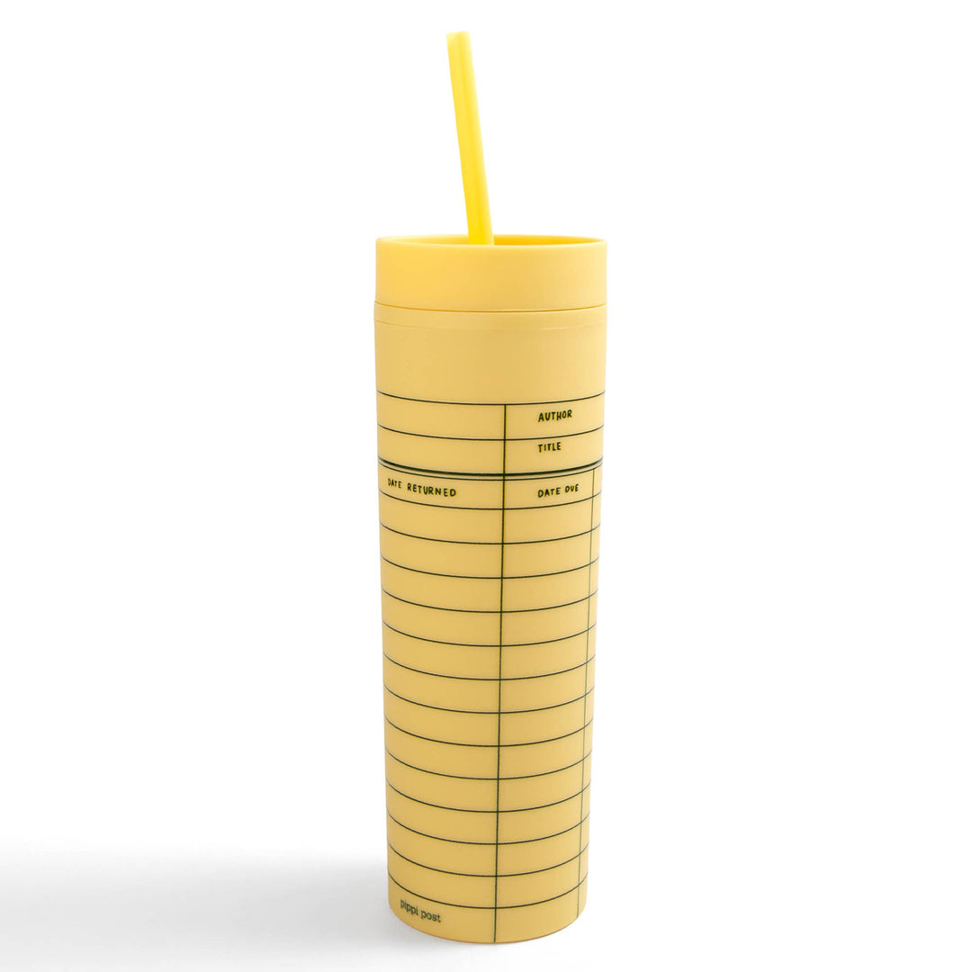 Yellow tumbler with a straw on a white background