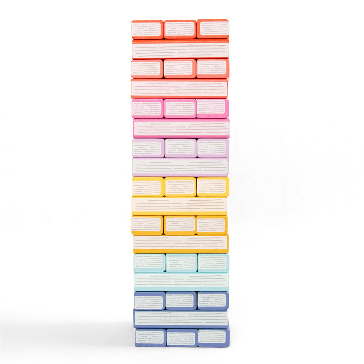 Stack of colorful folded towels on a white background