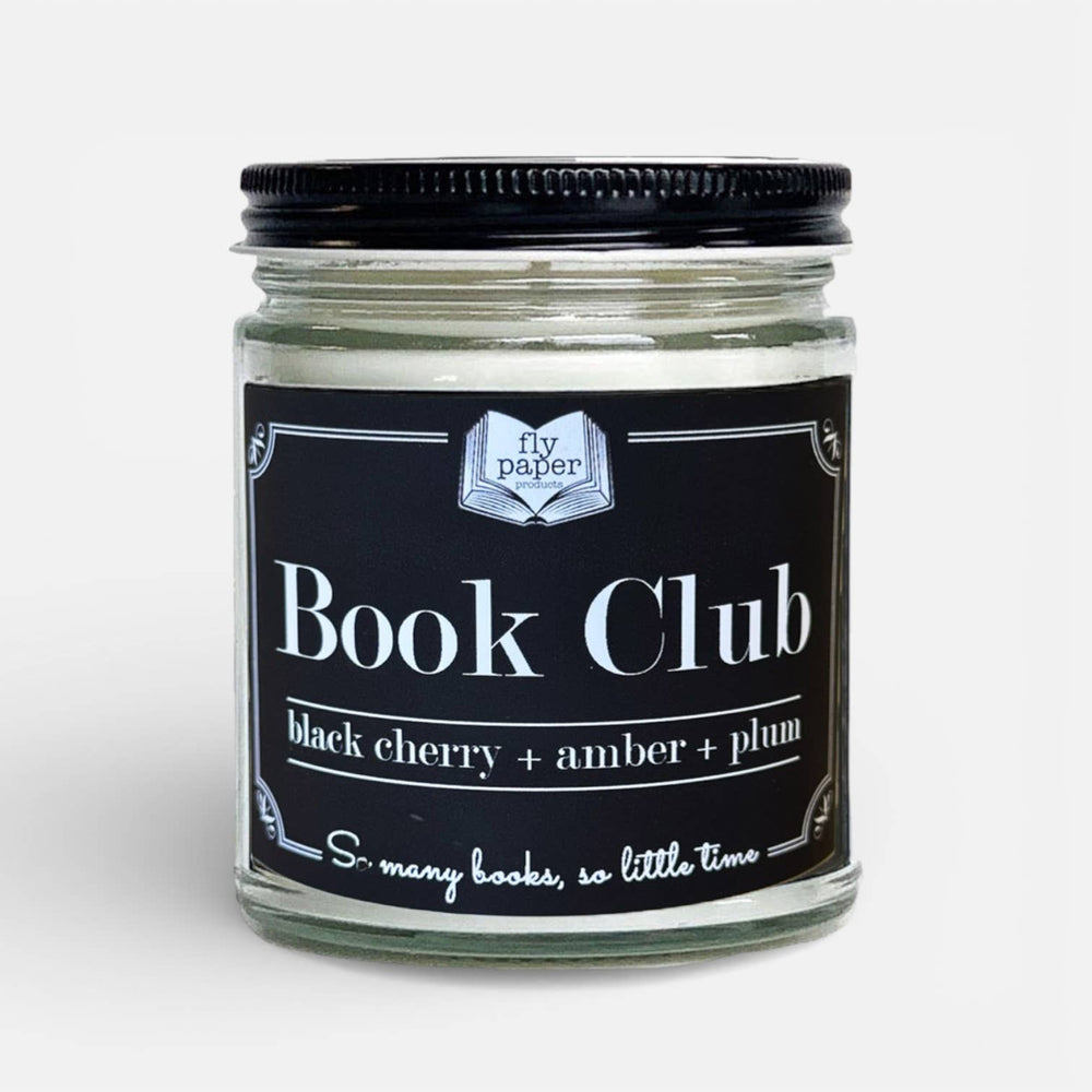 Candle jar labeled 'Book Club' with 'fly paper' branding on a white background