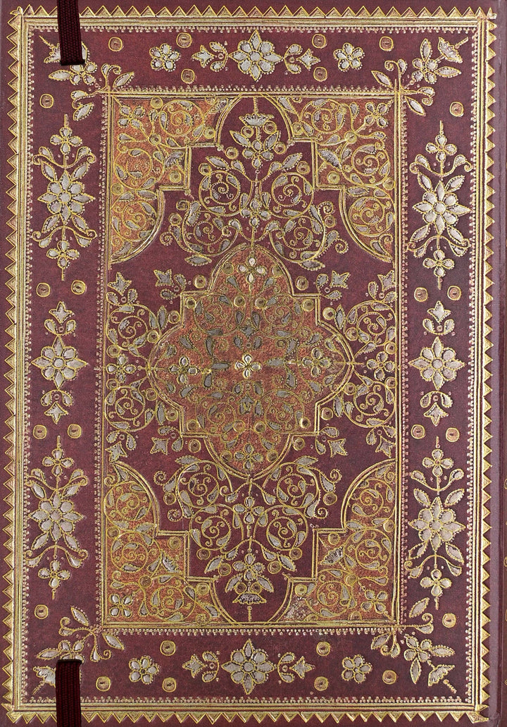 Decorative purple book with intricate gold and beige patterns