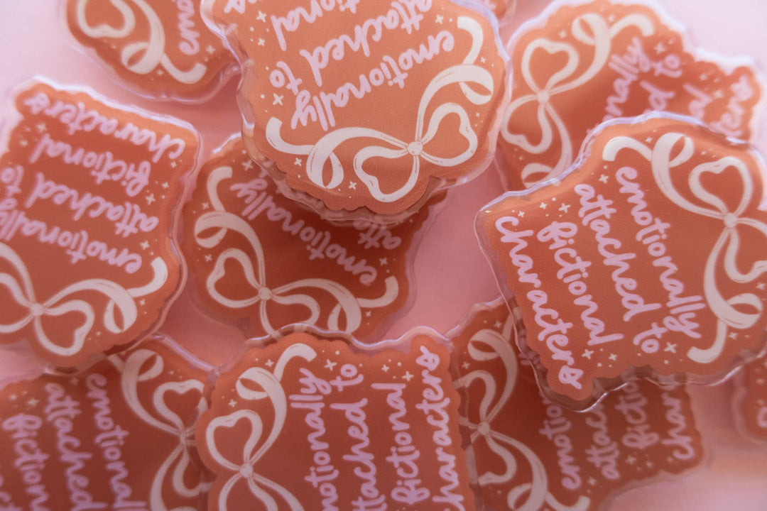 Heart-shaped candies with white text on a pink background