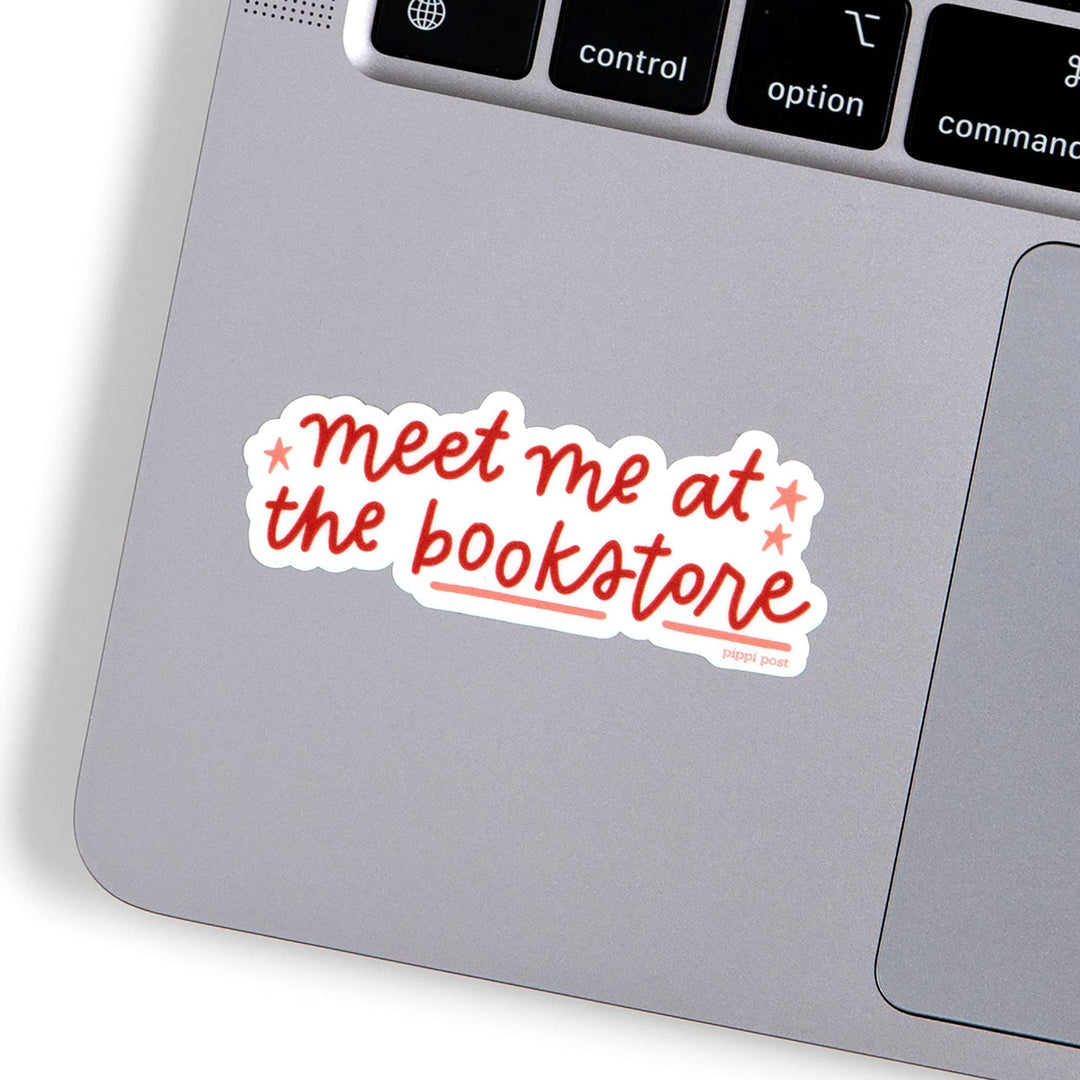 Sticker on a laptop keyboard with text &