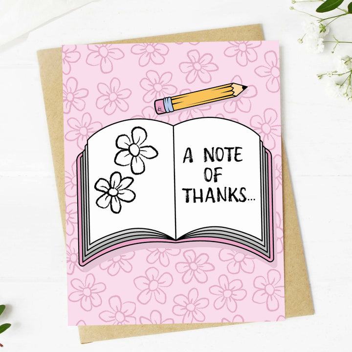 Greeting card with an open book illustration and &