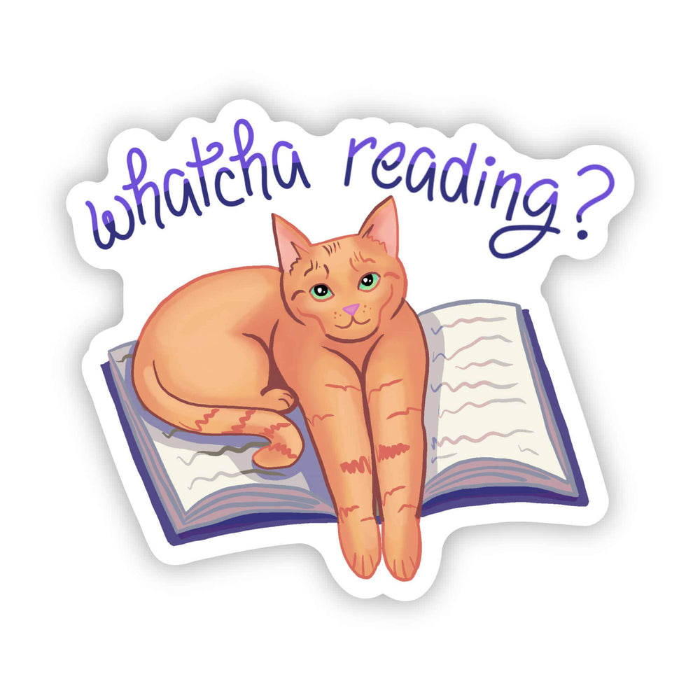 Cat sitting on an open book with 'whatcha reading?' text