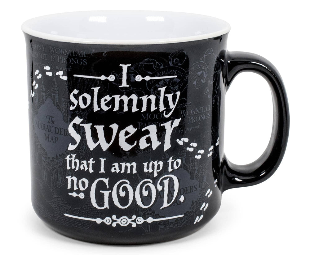 Black mug with white text on a white background