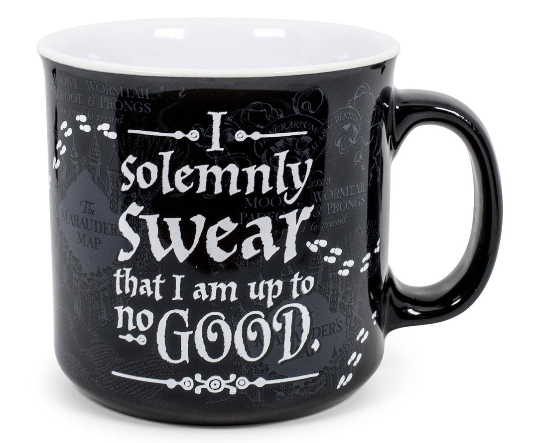 Black mug with white text on a white background