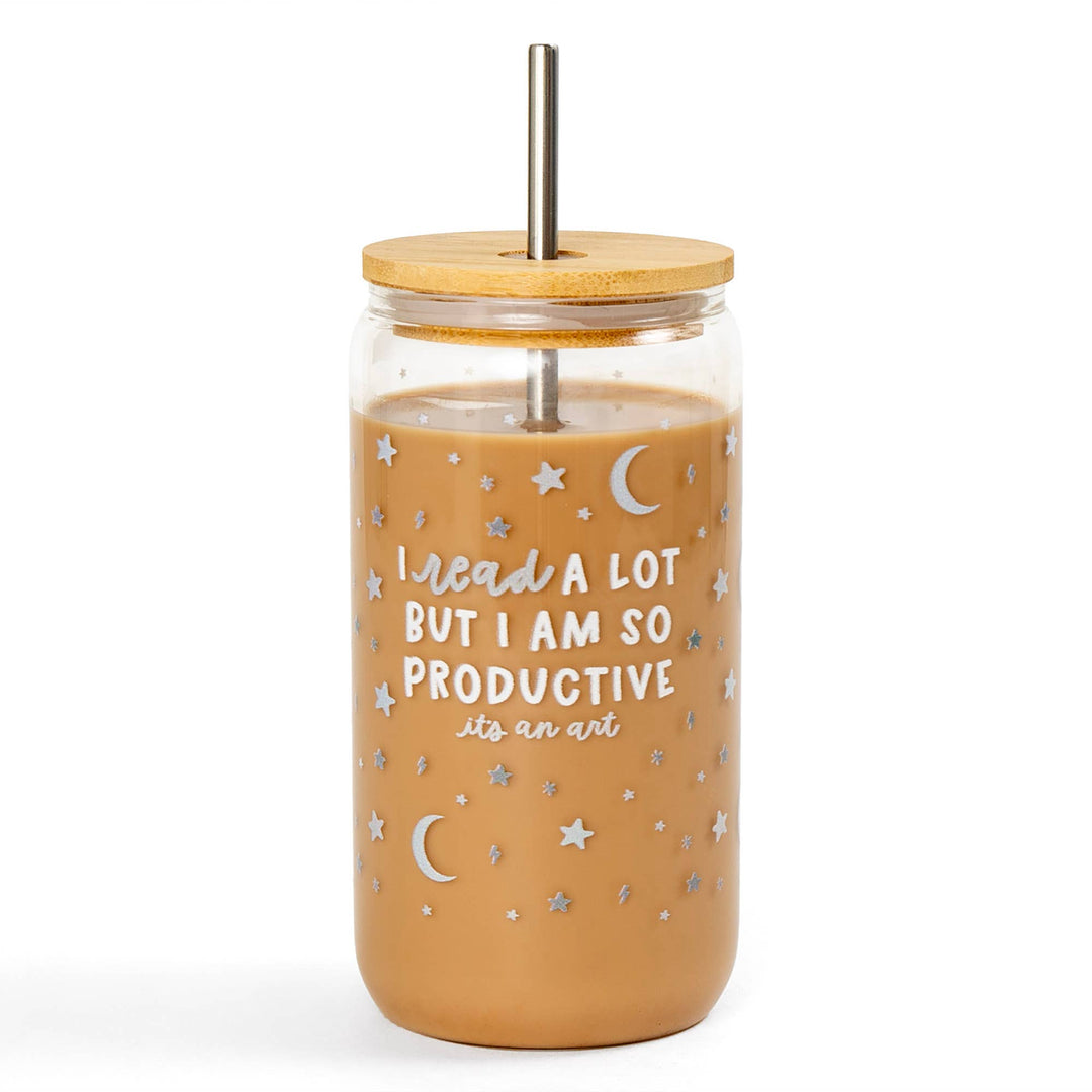Clear tumbler with wooden lid and straw, filled with a brown liquid, on a white background.