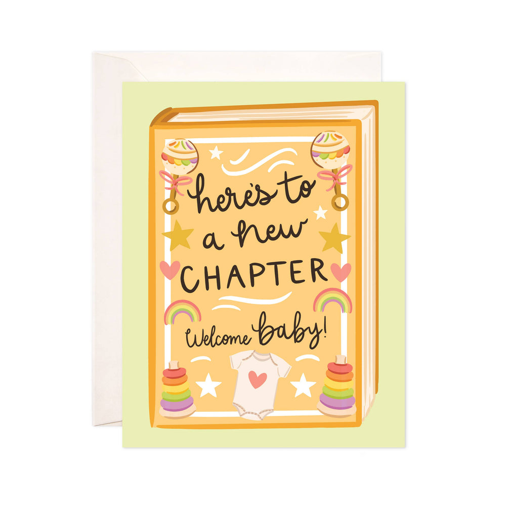 Greeting card with 'Here's to a new chapter, welcome baby!' text and baby-themed illustrations on a yellow background.