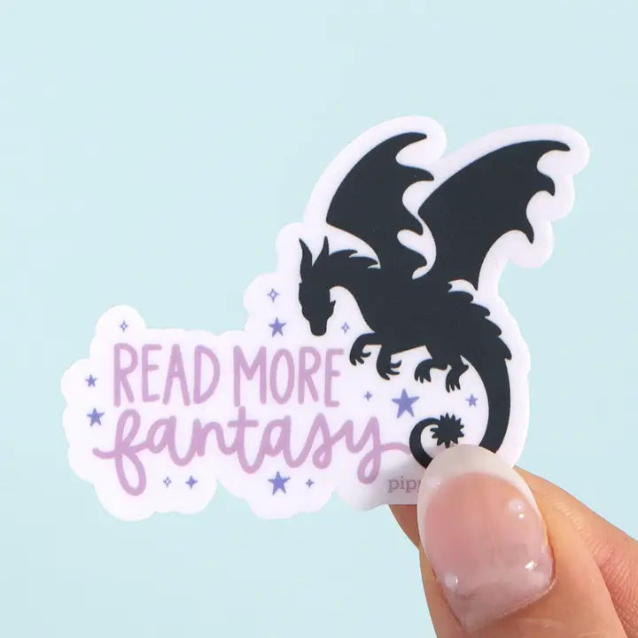 Sticker with a dragon design and 'Read More Fantasy' text on a light blue background