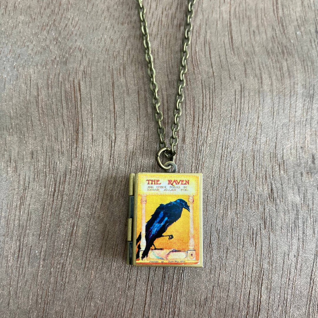 Necklace with a pendant featuring &