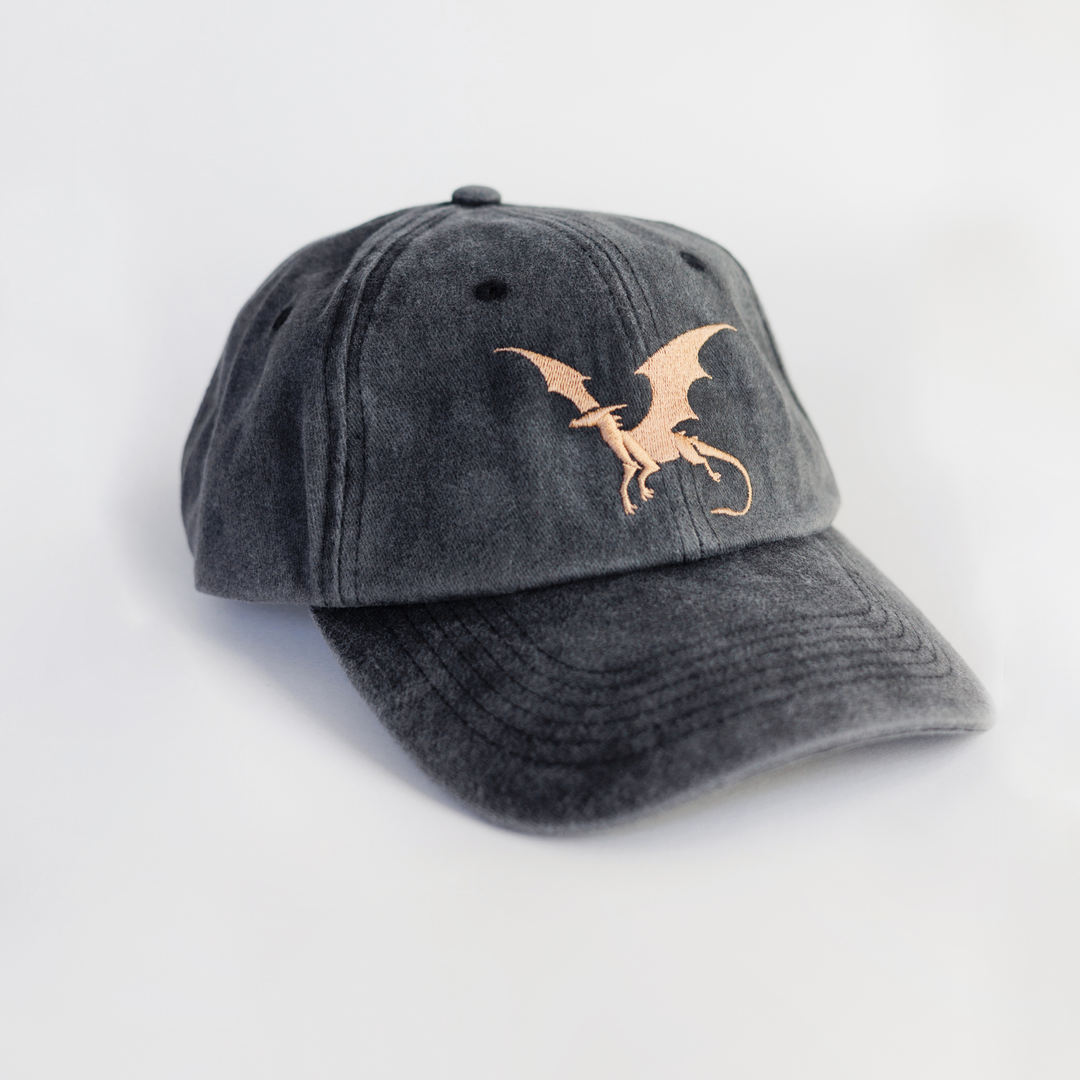 Gray cap with a gold dragon emblem on a light gray background