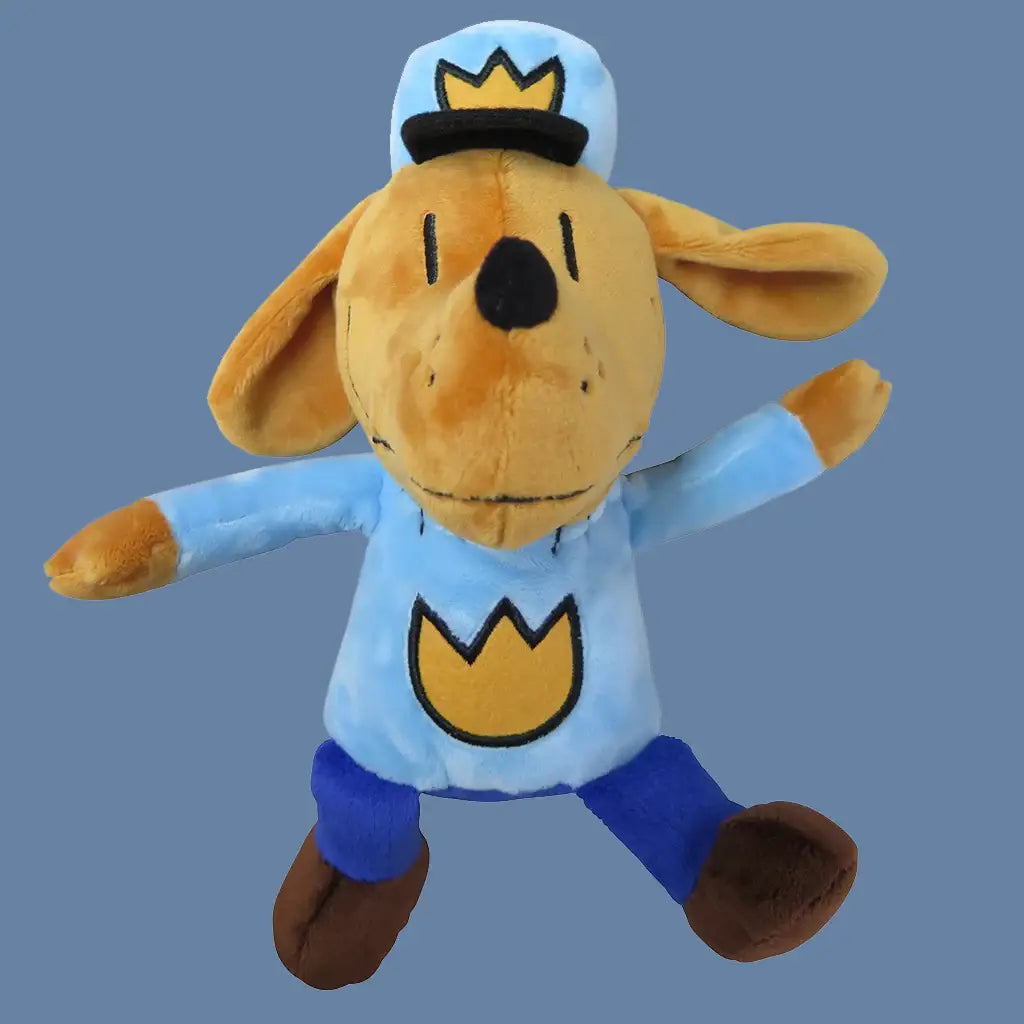Plush toy resembling a dog in a blue outfit with a yellow emblem on a blue background