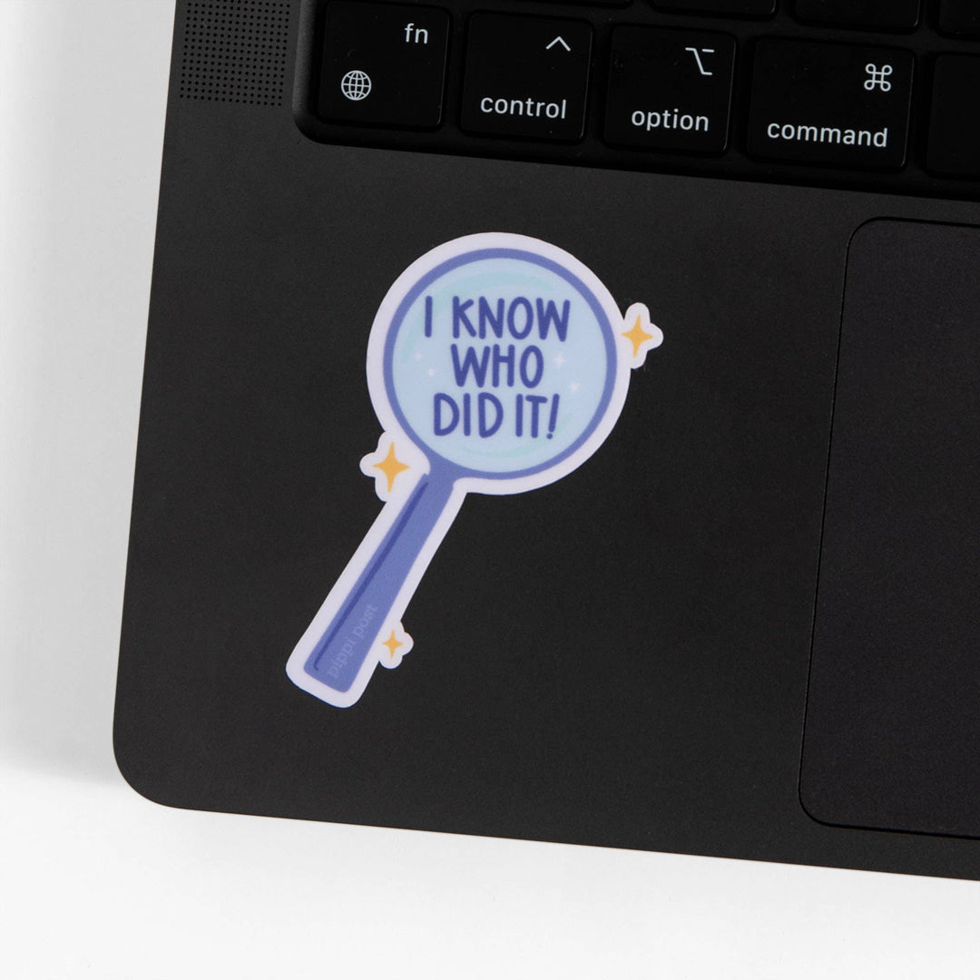 Laptop with a sticker on the palm rest area that says &