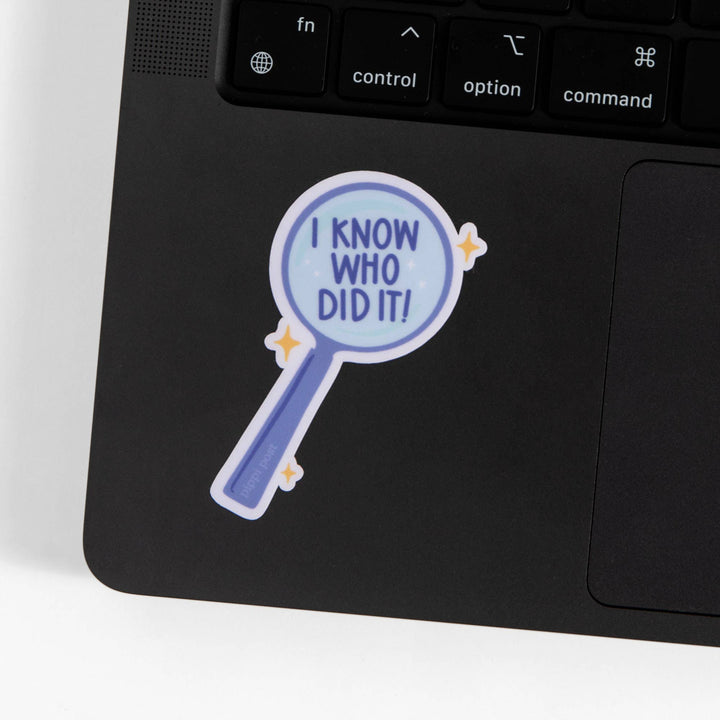 Laptop with a sticker on the palm rest area that says &