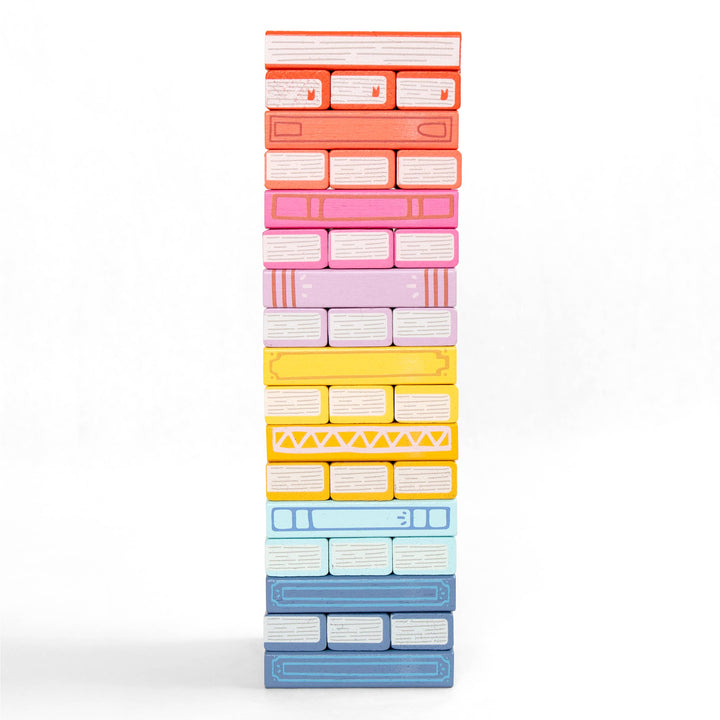 Stack of colorful cassette tapes on a white background
