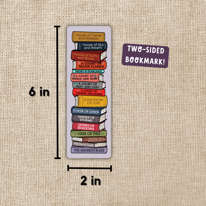 Two-sided bookmark with book spines design, shown with measurements on a textured beige background.