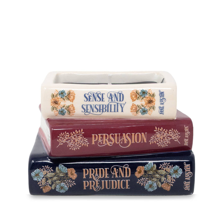 Front view of Jane Austen bookstack candle featuring Sense and Sensibility, Persuasion, and Pride and Prejudice.