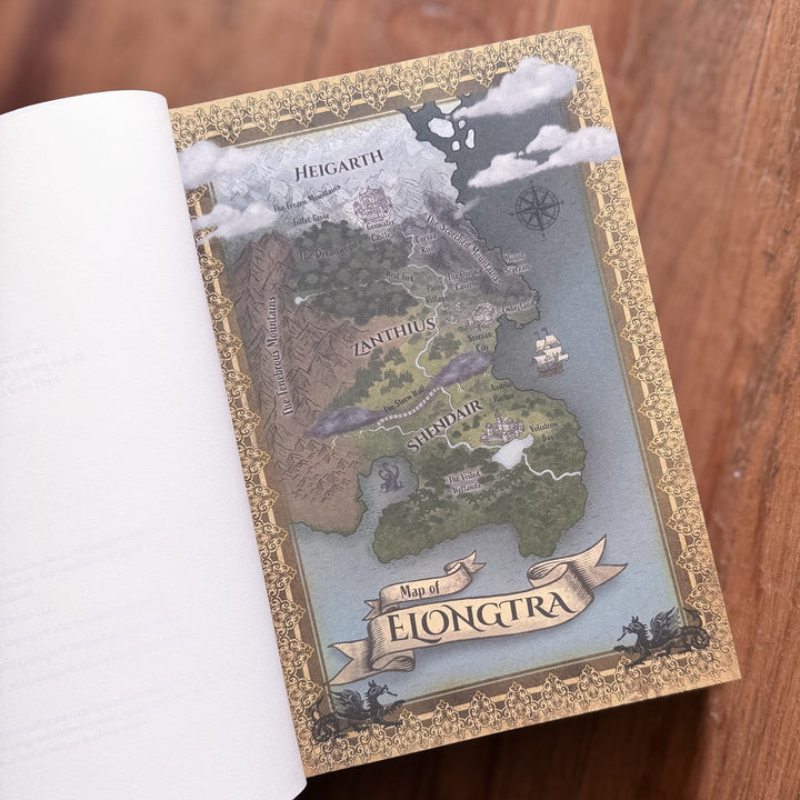 Map of Elongtura on a book with decorative gold border