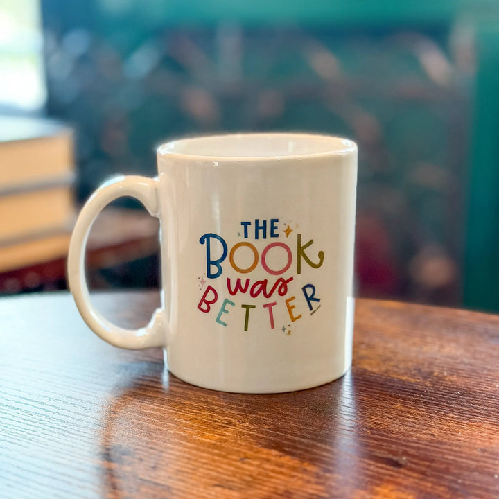 White mug with colorful text &