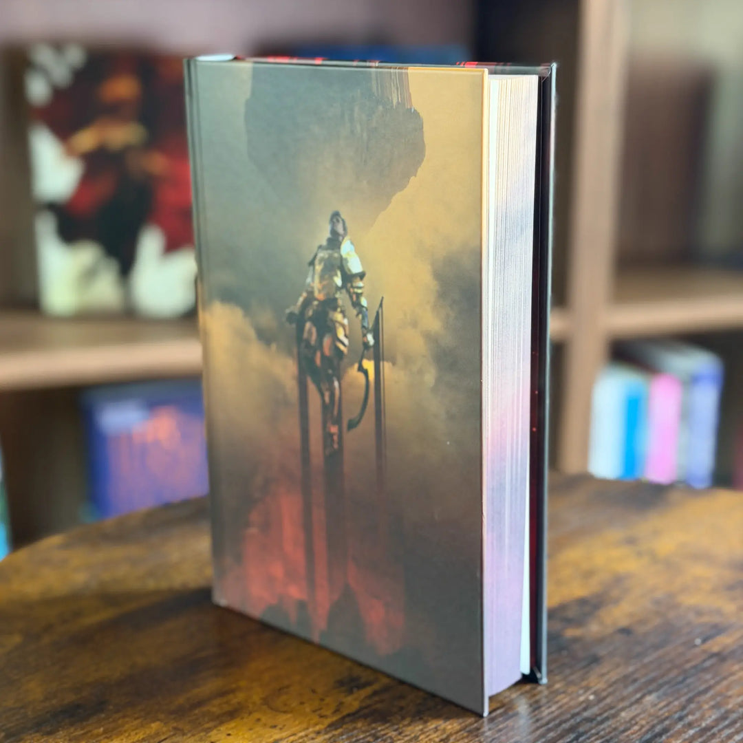 Book with a cover featuring a robot on a wooden surface with a blurred background
