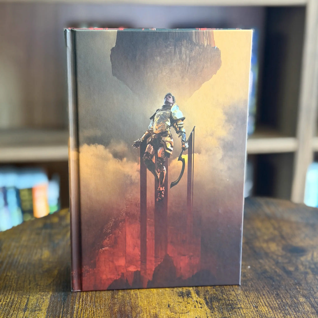 Book cover with a warrior and dragon design on a wooden surface
