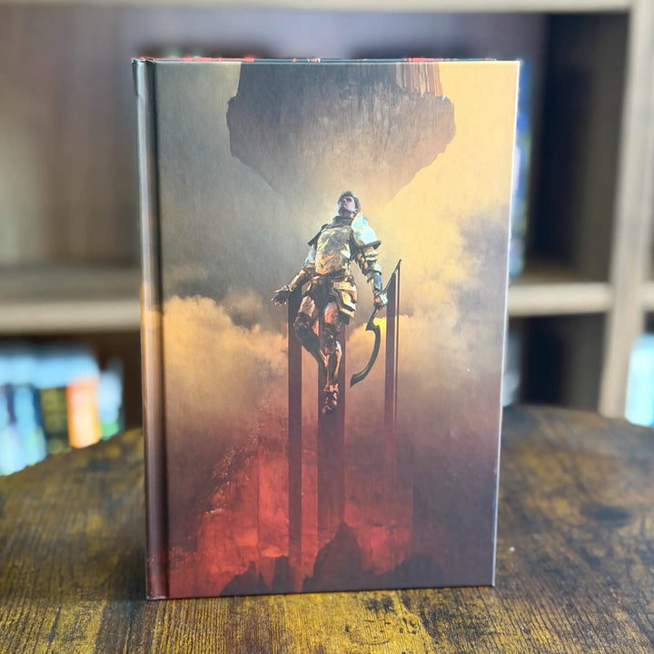 Book cover with a warrior and dragon design on a wooden surface