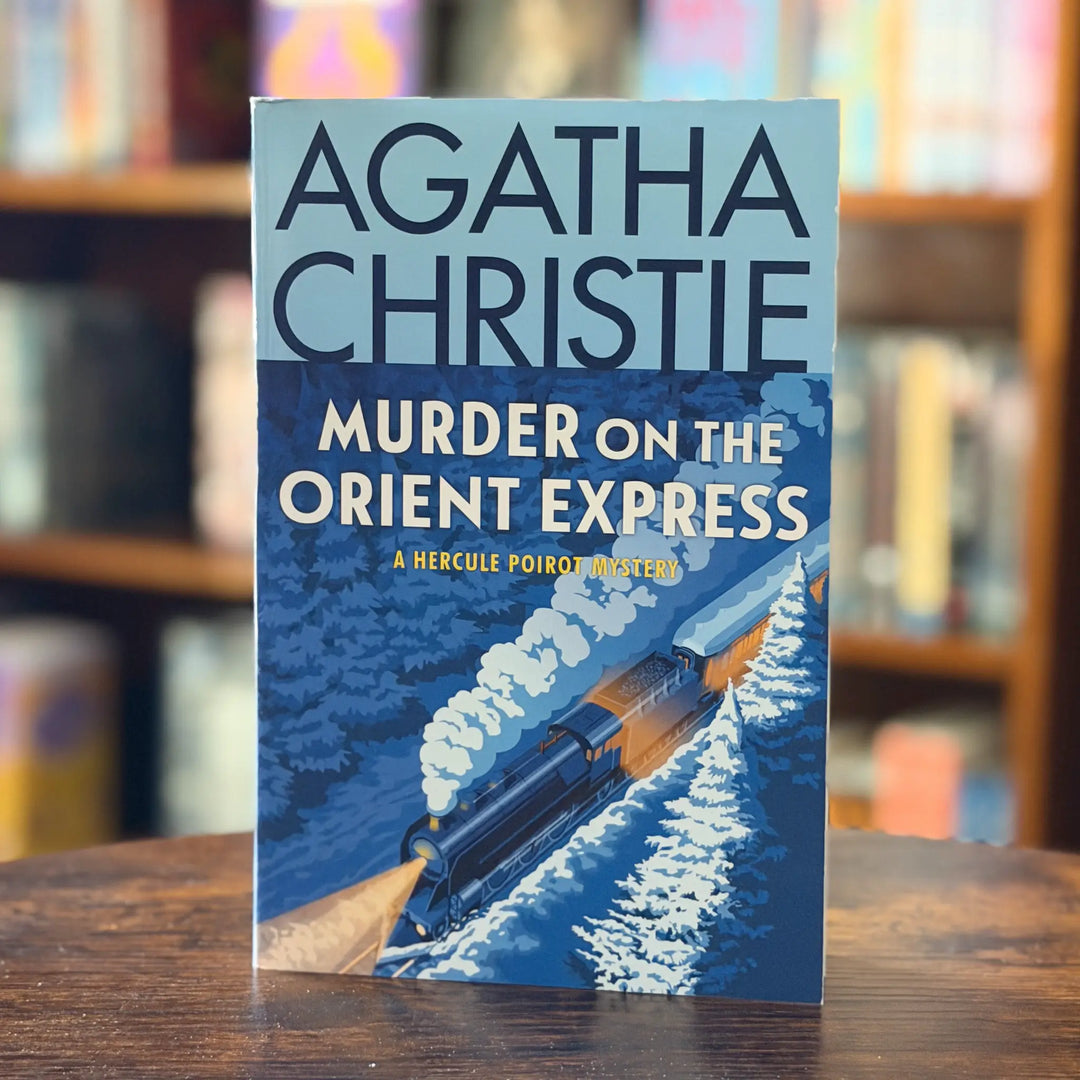 Book cover of 'Murder on the Orient Express' by Agatha Christie with a train illustration on a blue background.