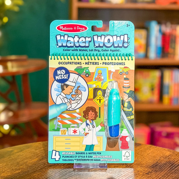 Melissa &amp; Doug Water WOW! Occupations book packaging on a wooden table with a blurred background