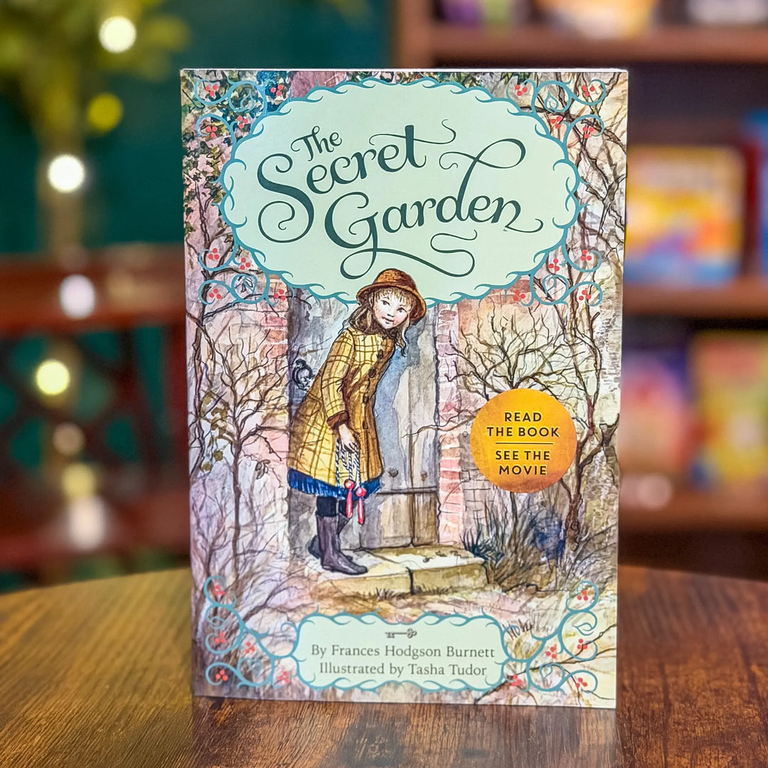 Book cover of 'The Secret Garden' with a blurred background