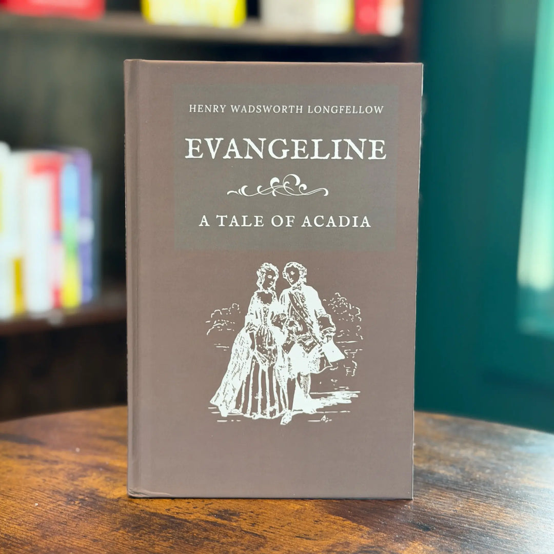 Book titled 'Evangeline: A Tale of Acadia' by Henry Wadsworth Longfellow on a wooden surface with a blurred bookshelf in the background.