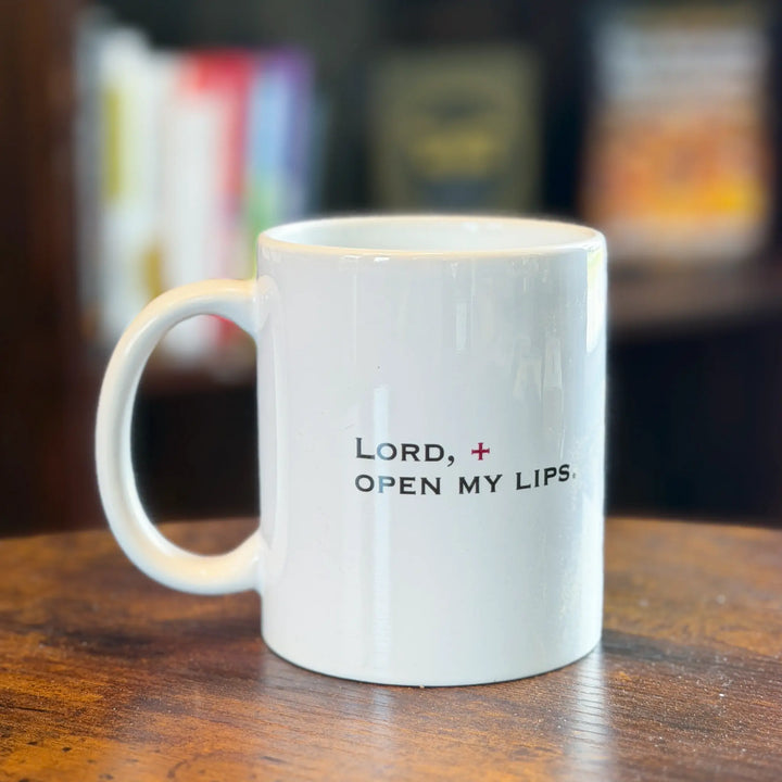 White mug with text &