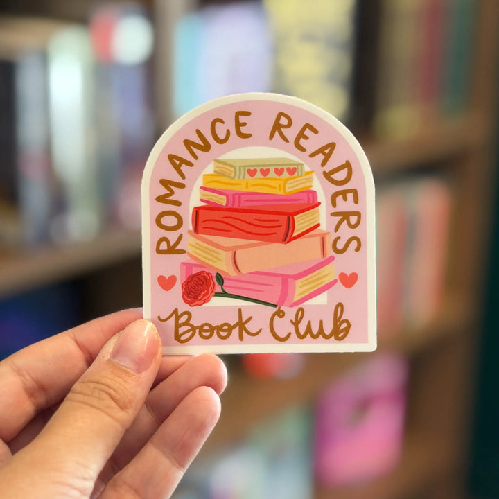 Sticker with books and a rose, featuring &