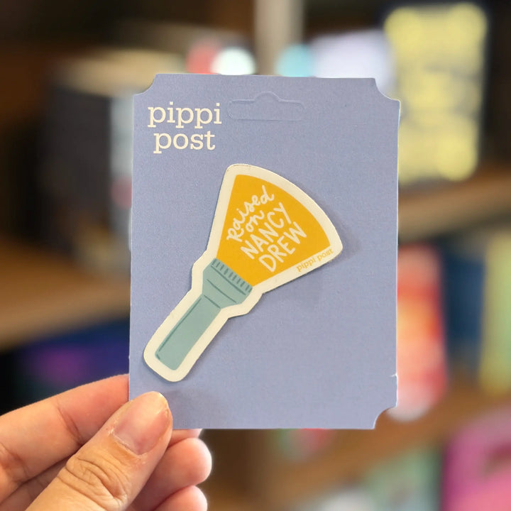 Card with a sticker of a flashlight and text &