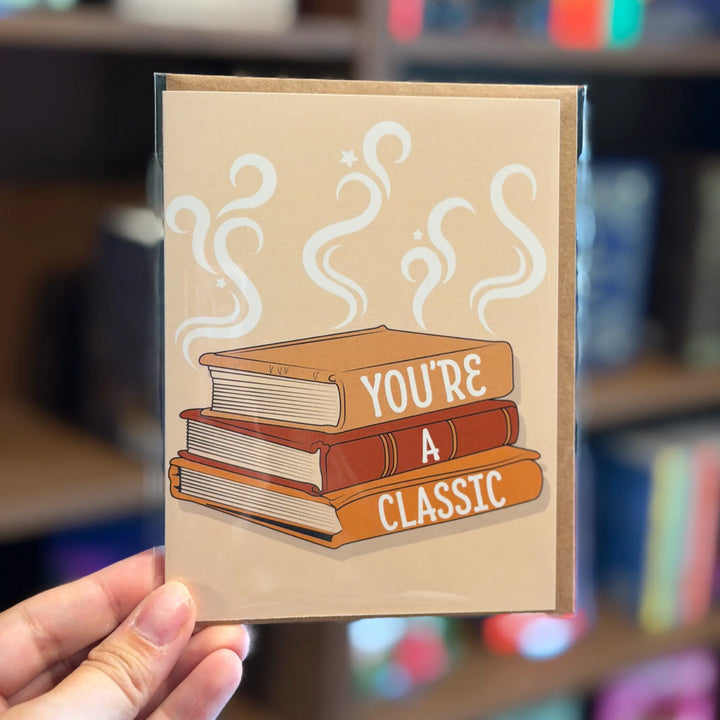 Card with books illustration and &