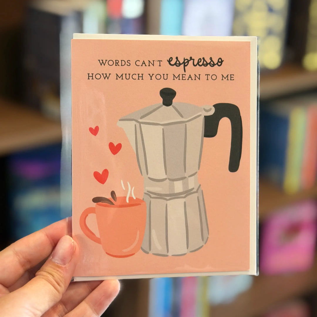 Card with illustration of espresso maker and cup, text 'Words can't espresso how much you mean to me', held by a hand.