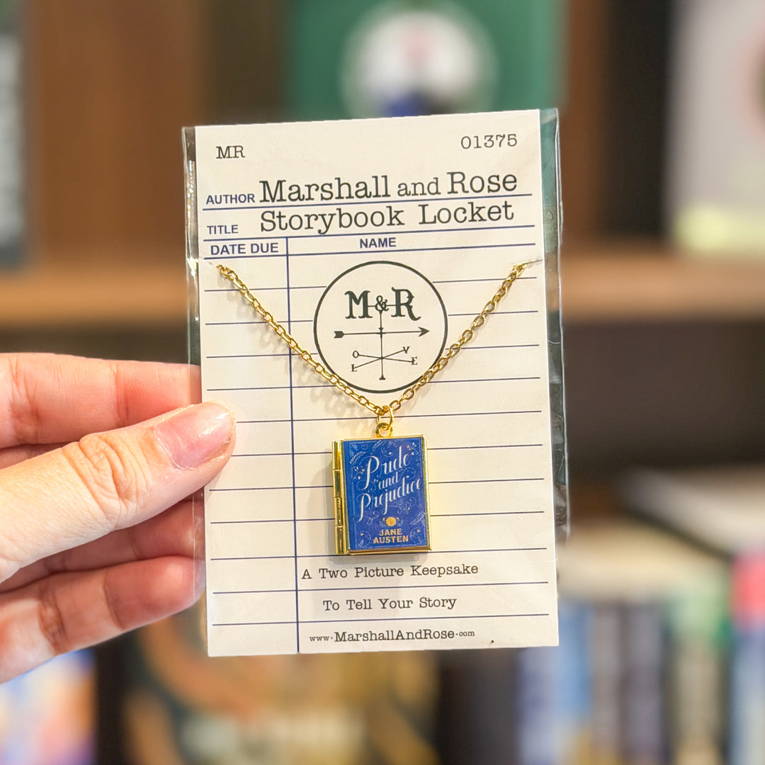 Gold necklace with 'Pride and Prejudice' book charm on a library card-style card.