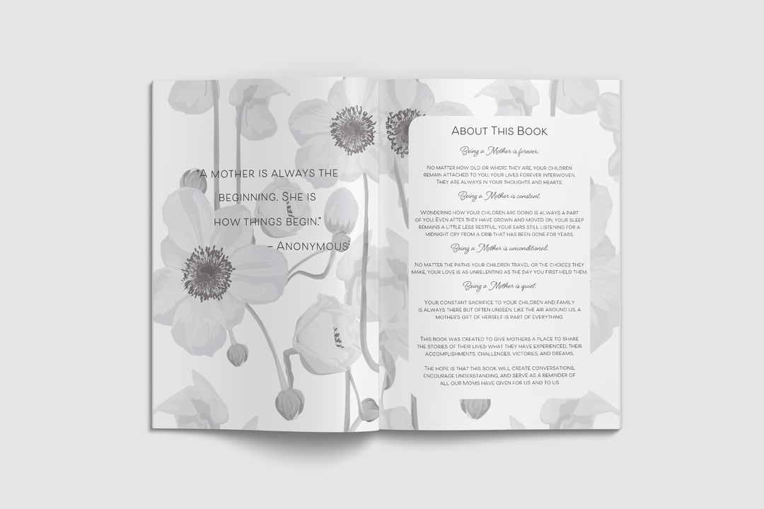 Open book with floral design on a white background