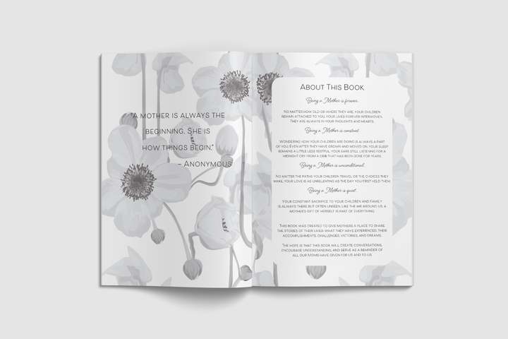 Open book with floral design on a white background