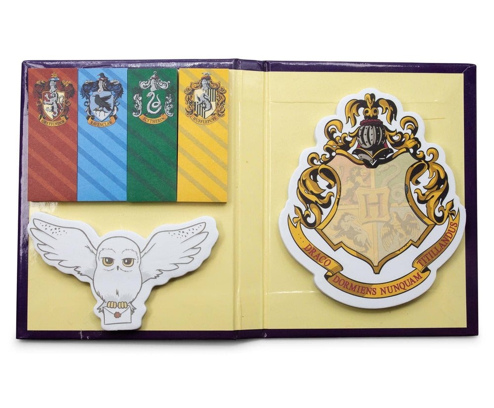 Open book with Hogwarts school crest and owl illustration on a white background