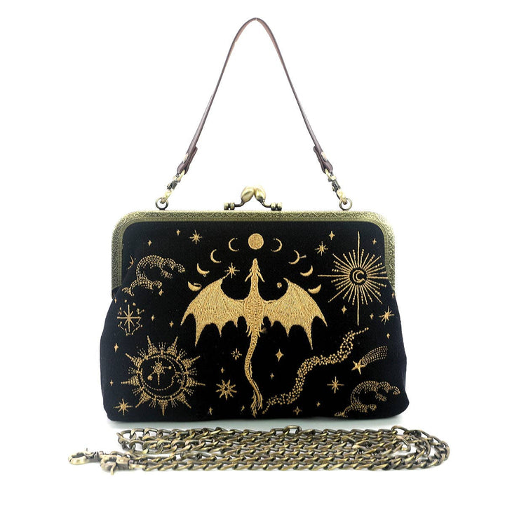 Black clutch bag with gold dragon and celestial designs on a white background