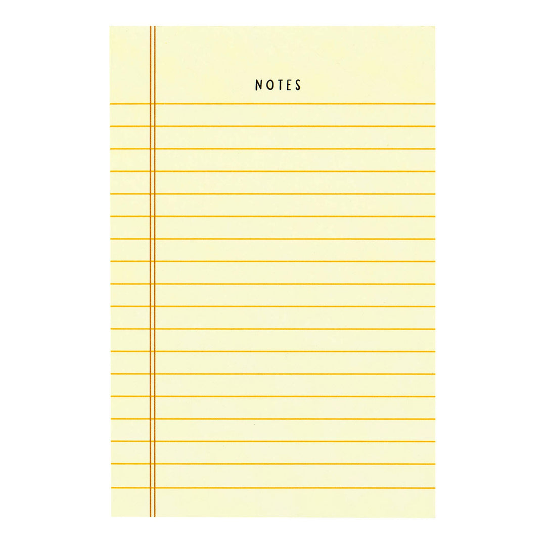 Yellow notepad with grid lines and &