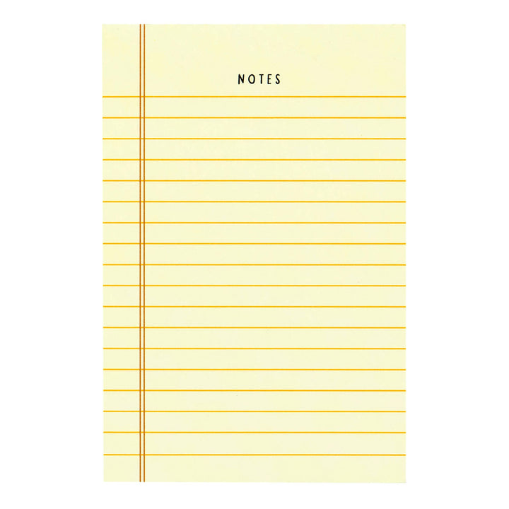 Yellow notepad with grid lines and &