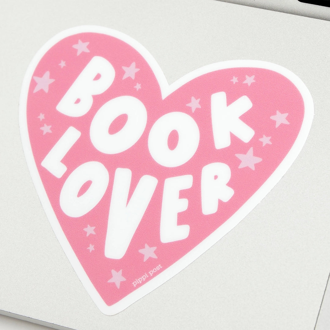 Pink heart-shaped sticker with &